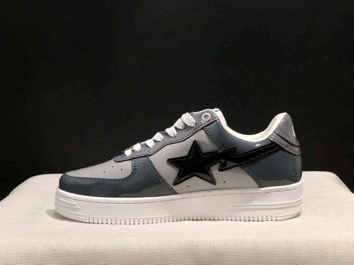 Side view highlighting the glossy black star detail and BAPE heel emblem.
