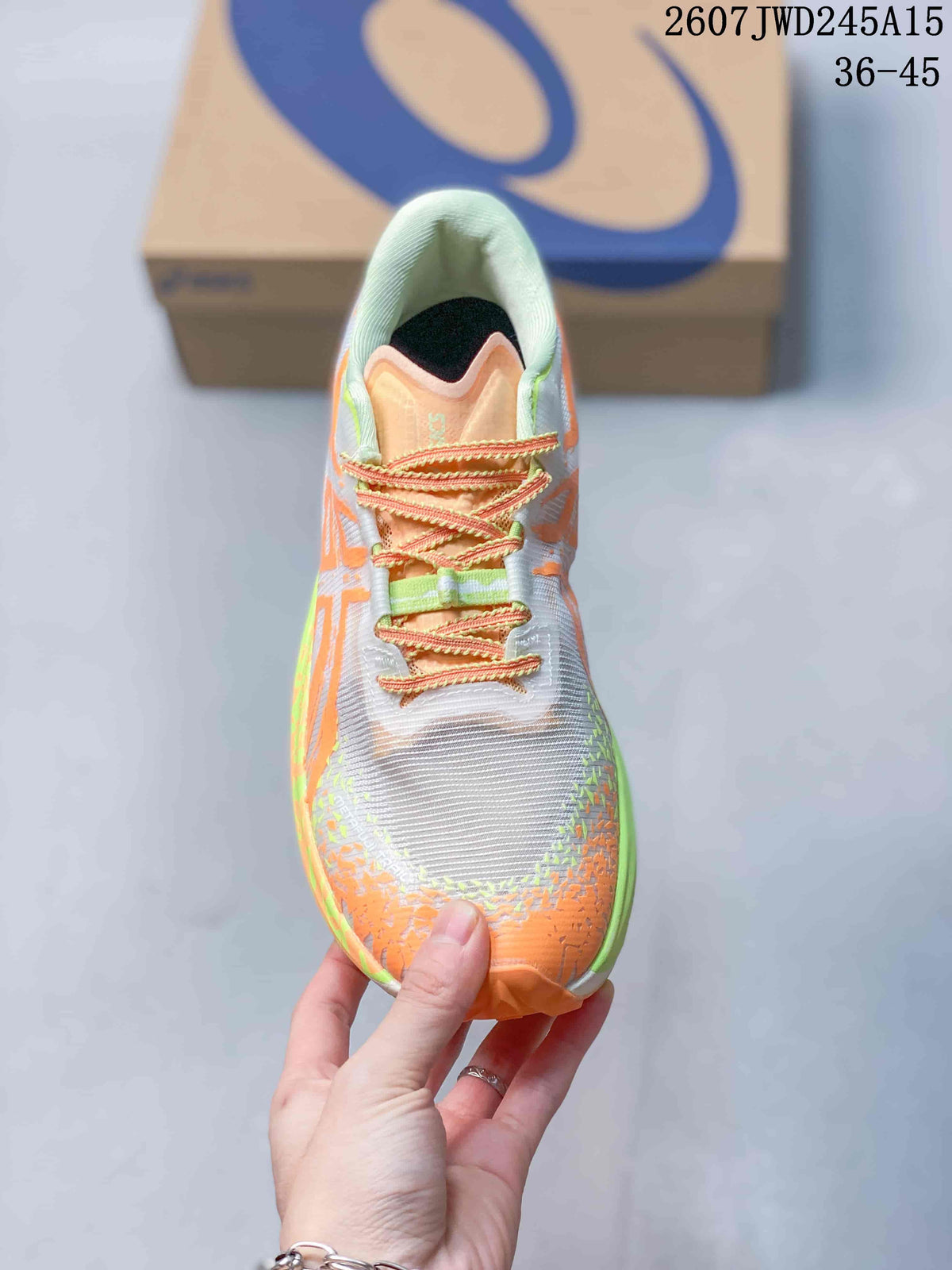 Top view of the sneaker showing the white mesh-style toe, orange toe overlay, patterned laces and lime trim; image text shows code 2607TWD245A15 and sizes 36–45.