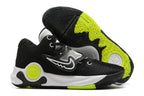 Black Nike KD basketball shoes with bright yellow-green outsole accents.
