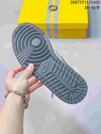 Close-up of the dark grey patterned outsole