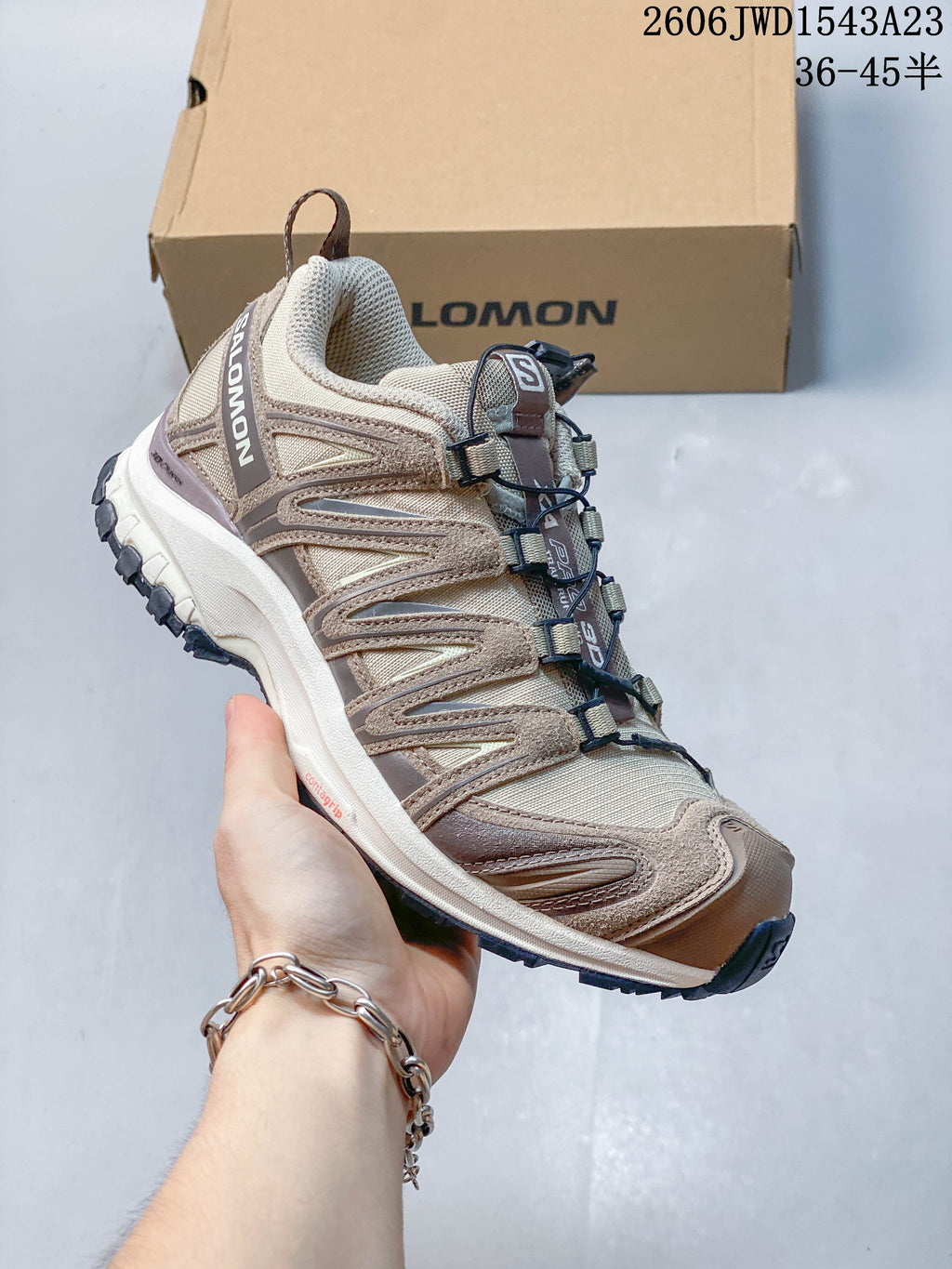Angled side view of the beige Salomon XA Pro 3D shoe