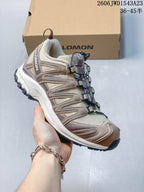 Angled side view of the beige Salomon XA Pro 3D shoe