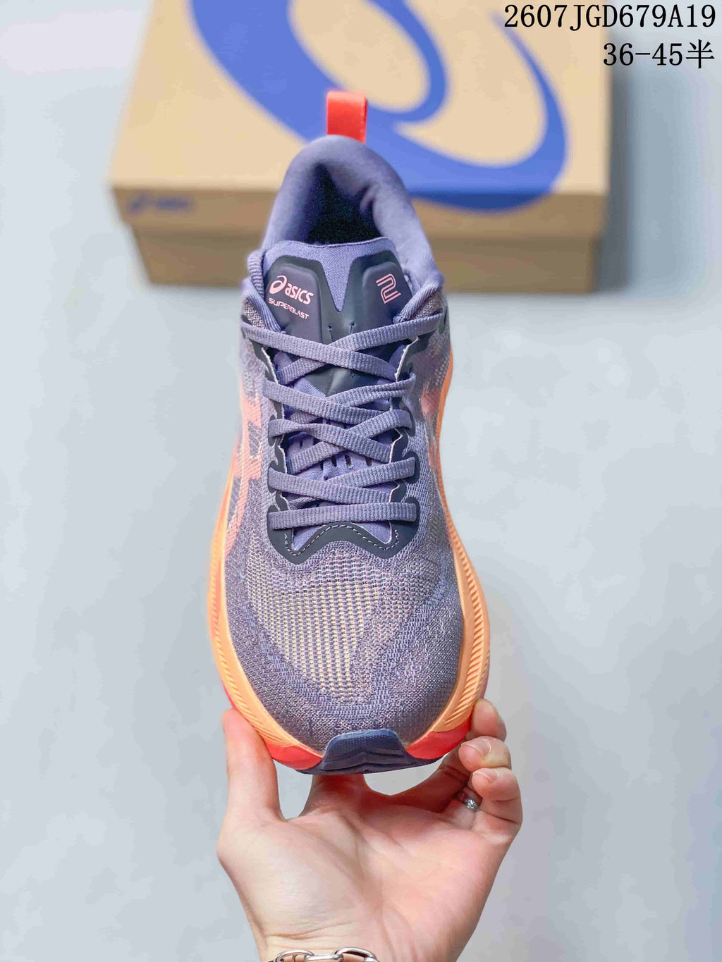 Front view showing the mesh-style toe box, lace-up construction, and contrasting tongue details.