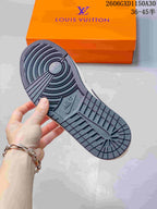 Close-up of the dark patterned outsole of the sneaker