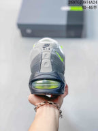 Rear view showing the heel branding, layered panels and a visible neon green heel air unit.