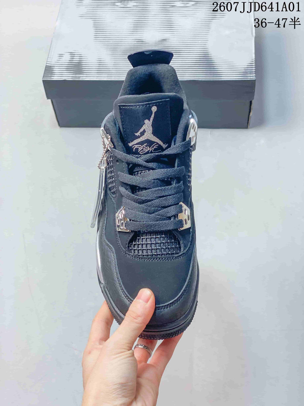 Front view showing the tongue, laces, and lace hardware