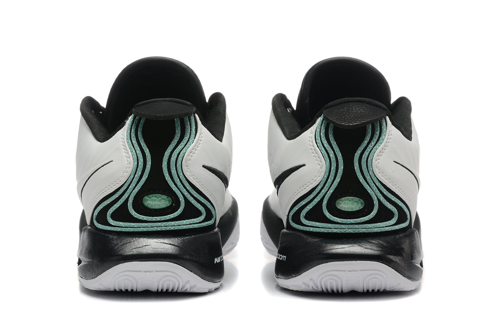 Rear view showing the black heel panels and mint-colored detailing