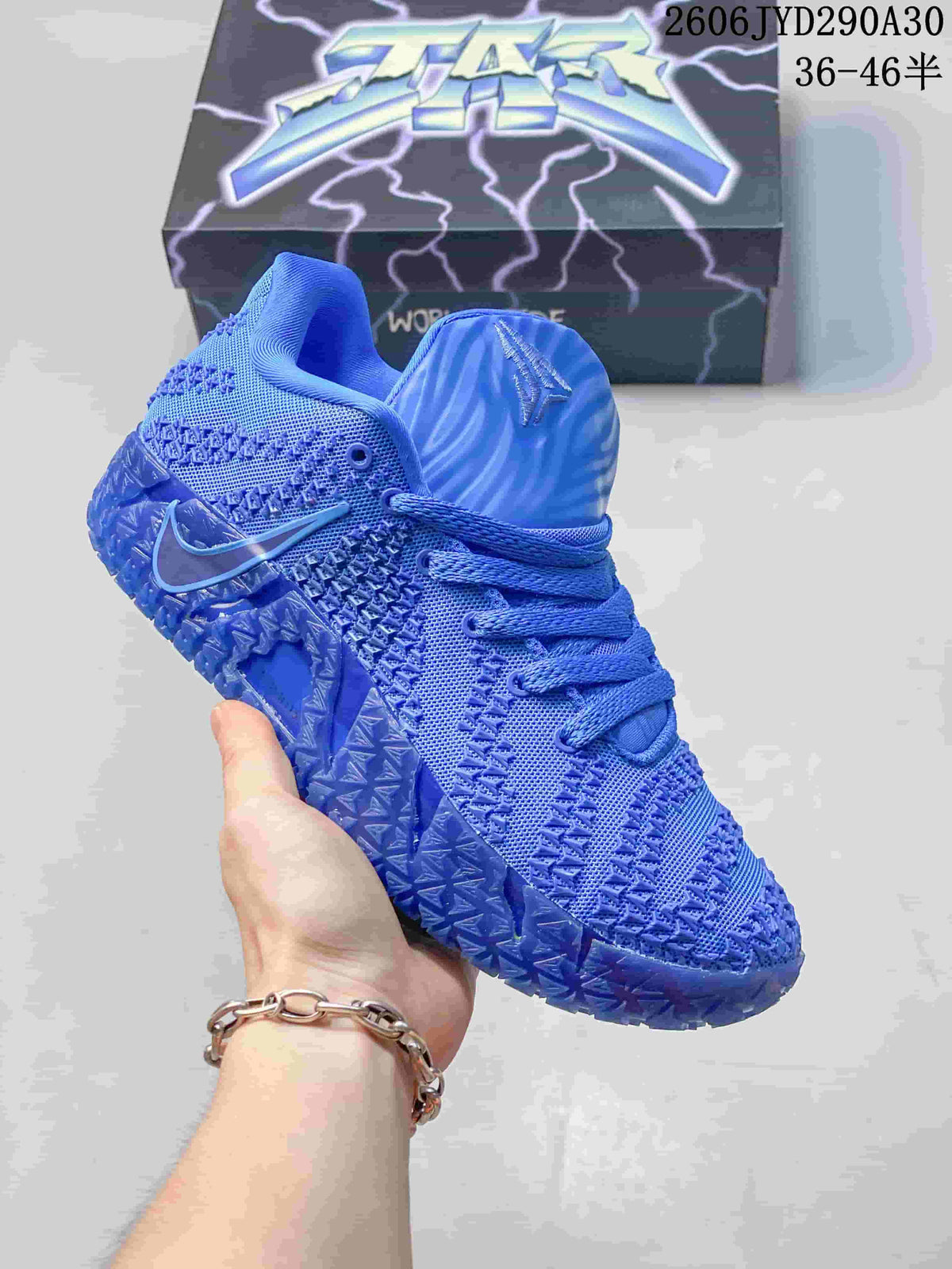 Blue Nike Ja 3 basketball shoe with tonal textured details