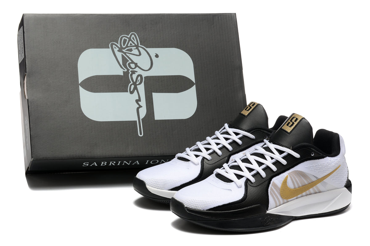 Pair of basketball shoes beside a box marked Sabrina Ionescu