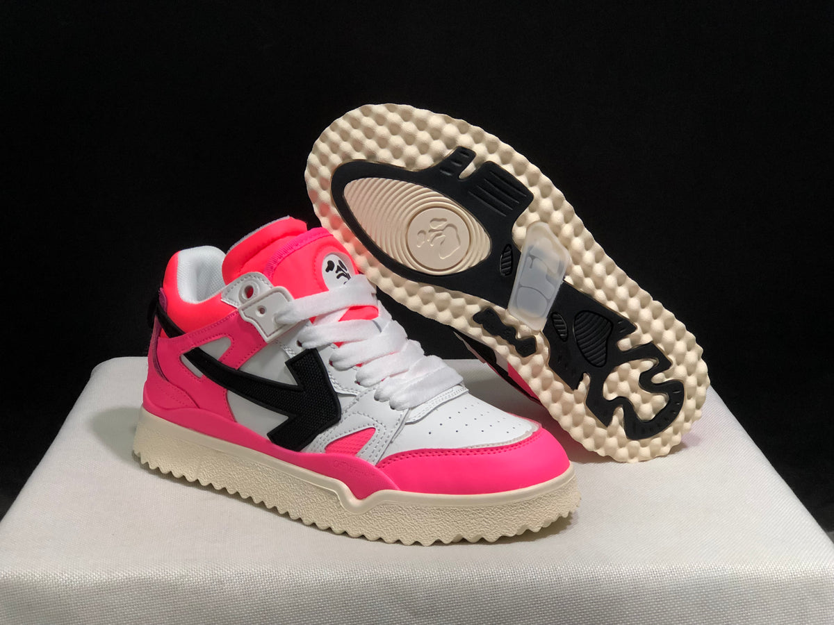 Angled view of one sneaker beside its outsole, showing the cream textured tread and black outsole sections.