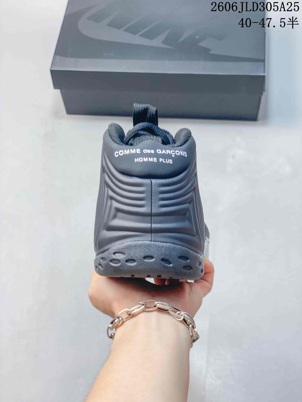 Rear view showing the shoe’s raised heel panels