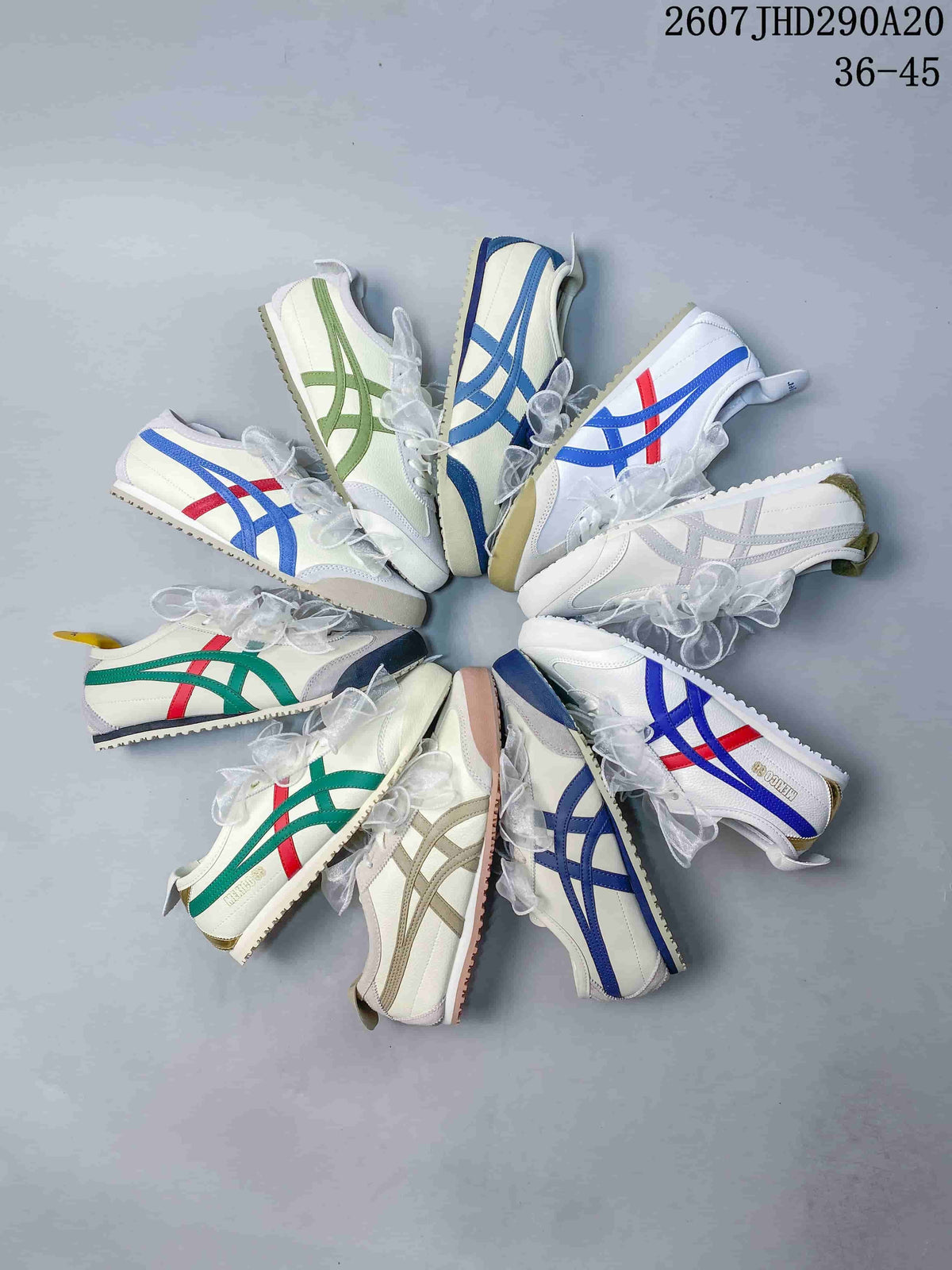 Overhead arrangement showing multiple white-based sneaker color variations with contrasting stripes.