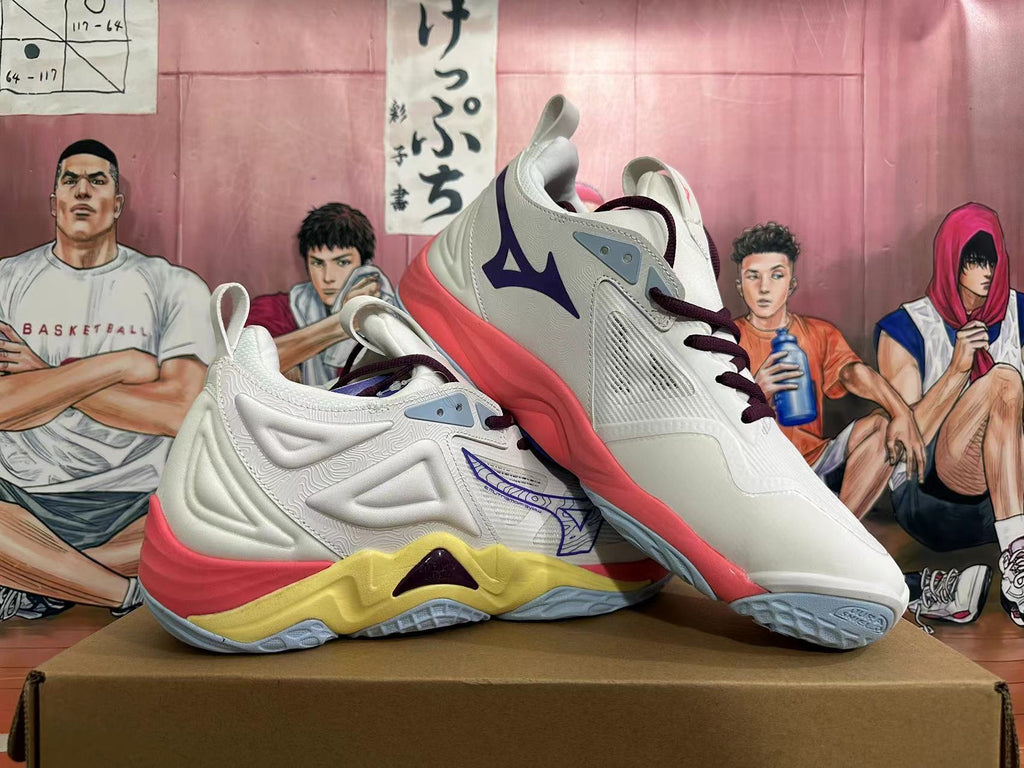 Angled side view of white Mizuno Wave Momentum 3 shoes with purple laces and coral and yellow accents.