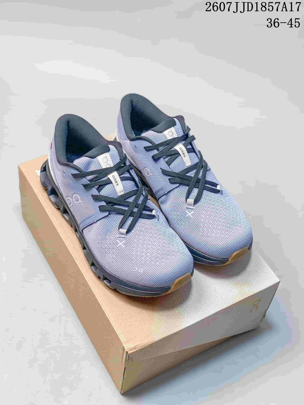 Blue-gray On Cloud X 4 sneakers displayed on a shoebox.