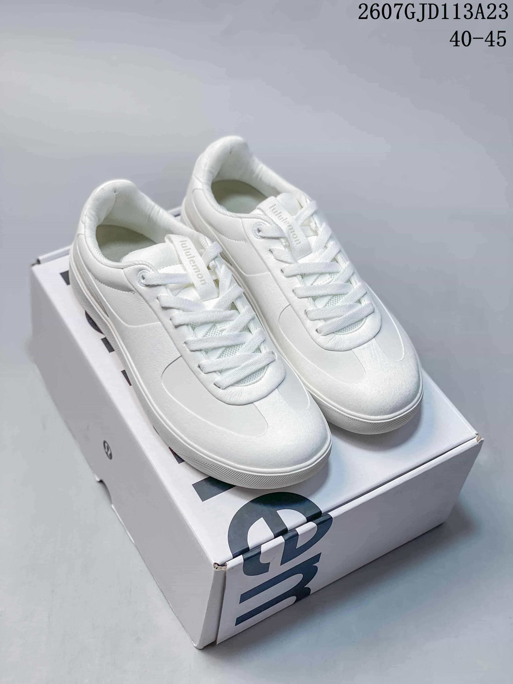 White lululemon Cityverse low-top sneakers with white laces and outsole displayed on a shoebox; image text shows style code 2607GJD113A23 and size range 40–45.