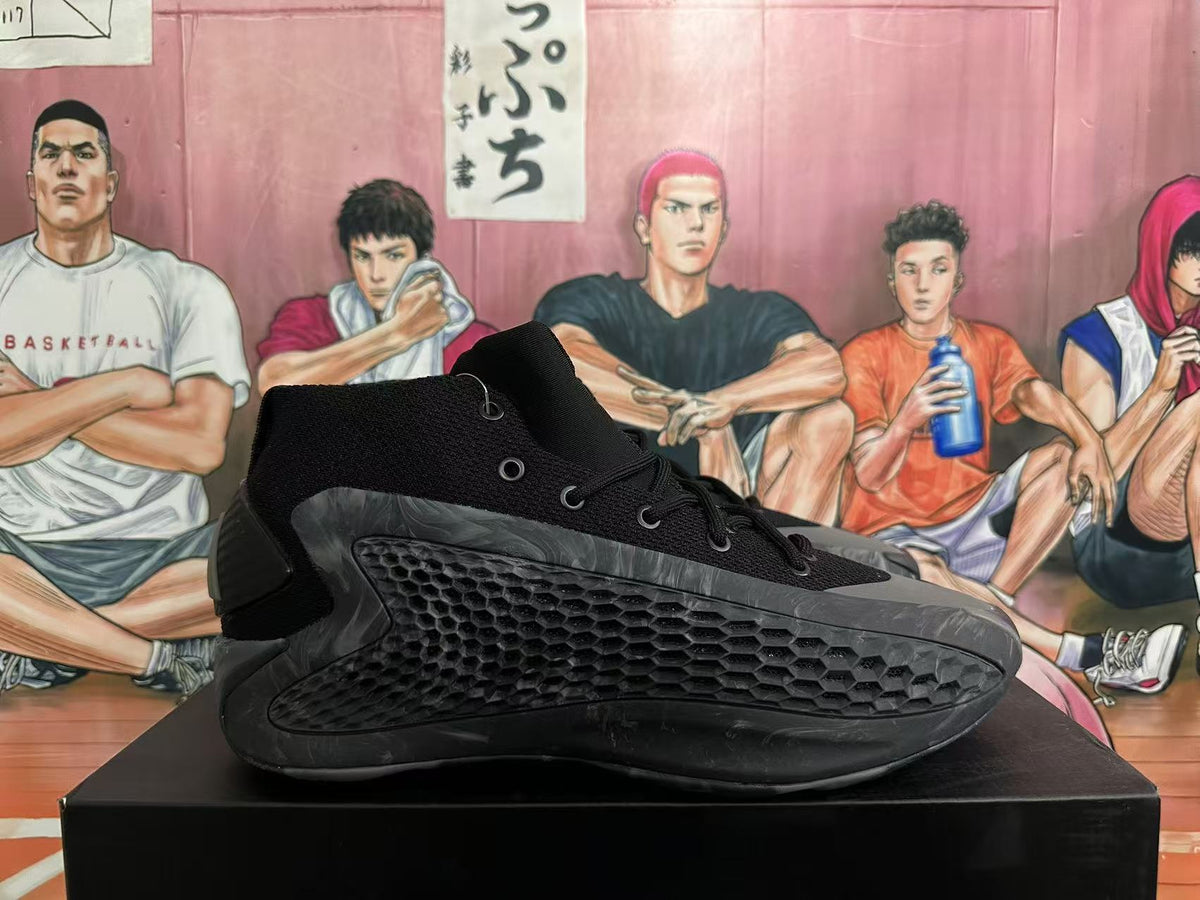 Side profile showing the textured dark gray panels and sculpted outsole.