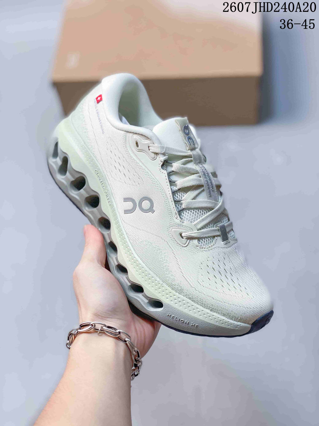 Angled side view of a white On CloudTilt sneaker showing the textile upper, lace system, side logo and sculpted outsole.