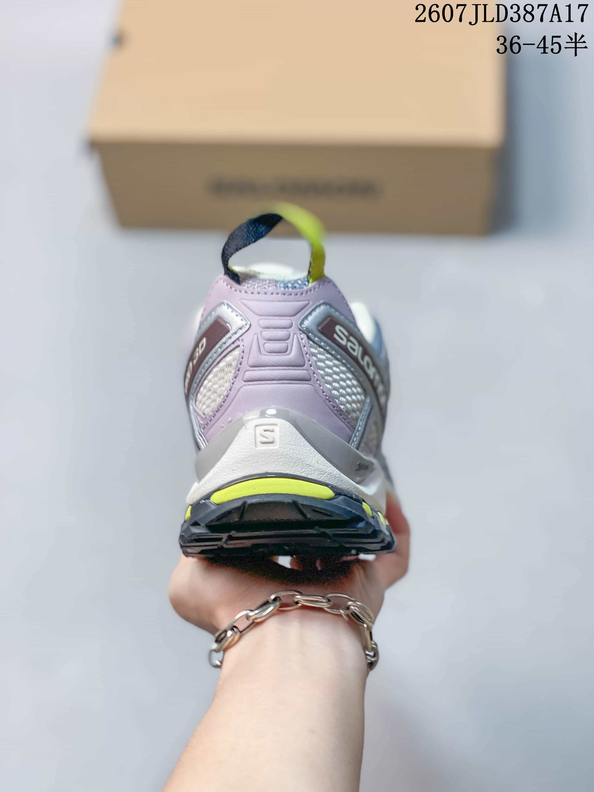 Rear view of a Salomon XA PRO 3D shoe showing the padded heel, lime accent and layered outsole.