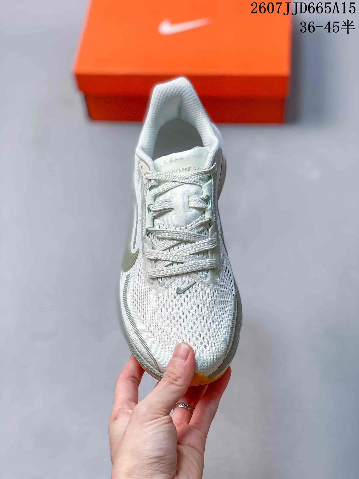 Top view of a Nike Pegasus 42 sneaker showing the lace system, tongue branding, perforated-looking upper, and rounded toe.
