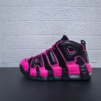 Side profile of a black and pink Nike Air More Uptempo sneaker