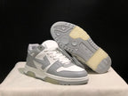 Angled product view with one sneaker lifted to reveal the patterned outsole and translucent sections.