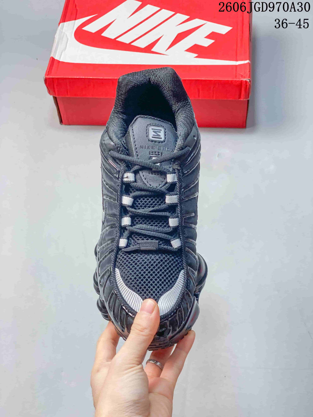 Top view of a Nike Shox TL sneaker showing its mesh-look tongue and laces