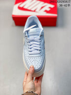 Top view of the sneaker showing the perforated toe, light-colored laces and padded tongue.