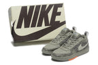Nike Book 1 shoes displayed beside a Nike-branded box
