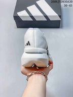 Rear view of a white adidas Adizero Prime X3 running shoe.
