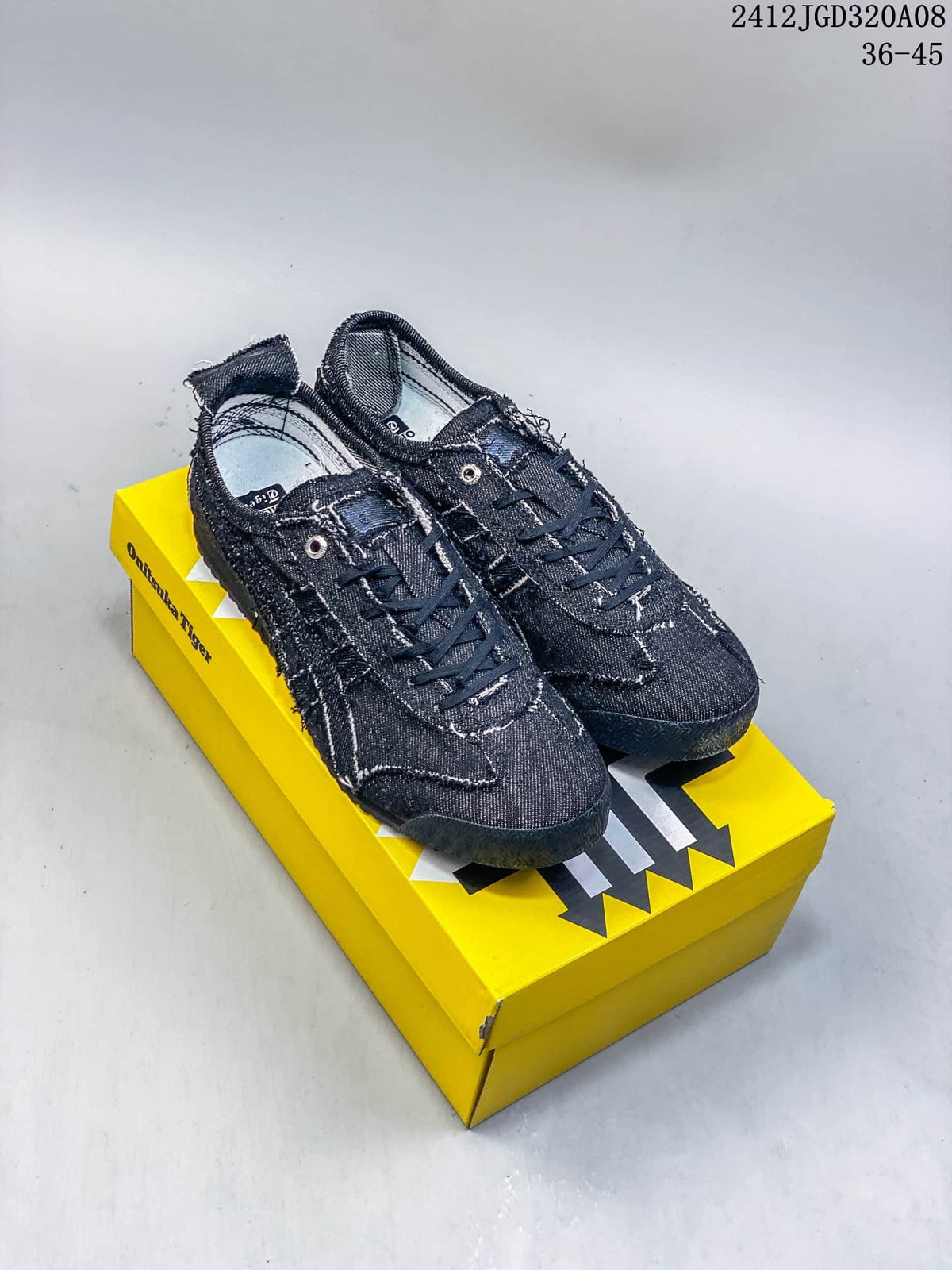 Pair of dark blue Onitsuka Tiger Mexico 66 SD sneakers displayed on a yellow shoe box; style code 2412JGD320A08 and range 36-45 are visible.