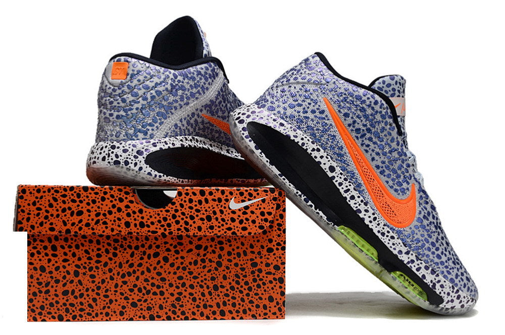 Patterned blue and white Nike GT Hustle 3 shoes displayed from the heel and side.