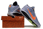 Patterned blue and white Nike GT Hustle 3 shoes displayed from the heel and side.