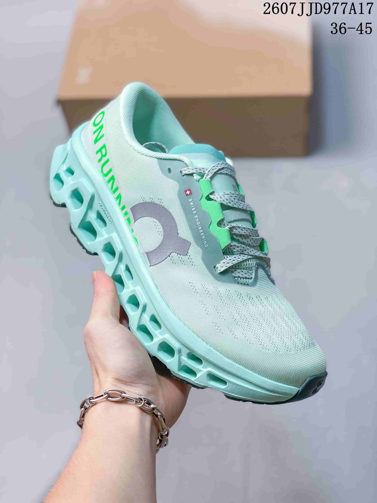 Angled side view of the mint green On sneaker showing the gray logo, green heel lettering, and segmented outsole.