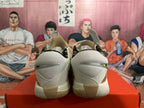 Rear view of white and yellow Nike basketball shoes with sculpted heel panels