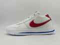 Side view of a white low-top Nike sneaker with a red Swoosh and blue outsole accent.