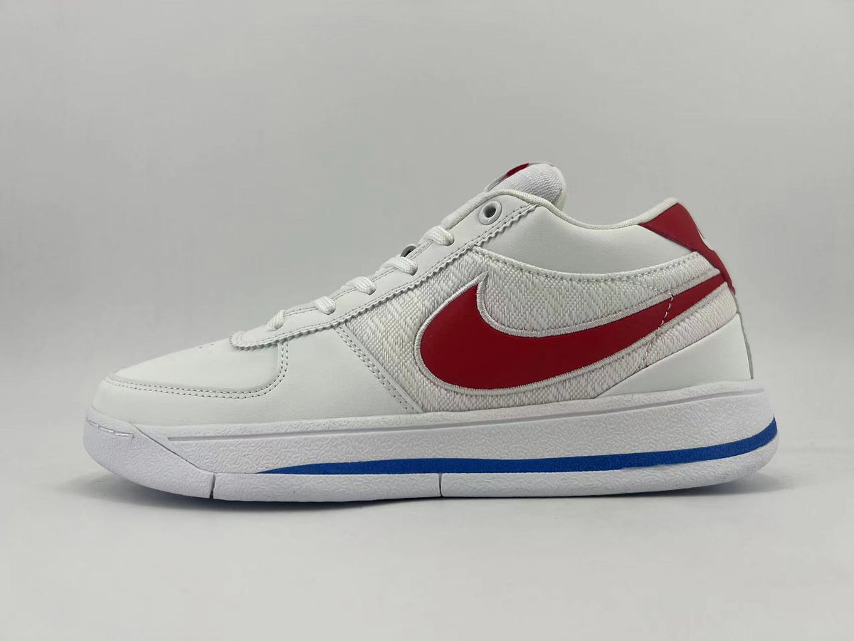 Side view of a white low-top Nike sneaker with a red Swoosh and blue outsole accent.