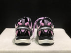 Rear view showing the heel pull tabs, black heel panels, and white midsoles.