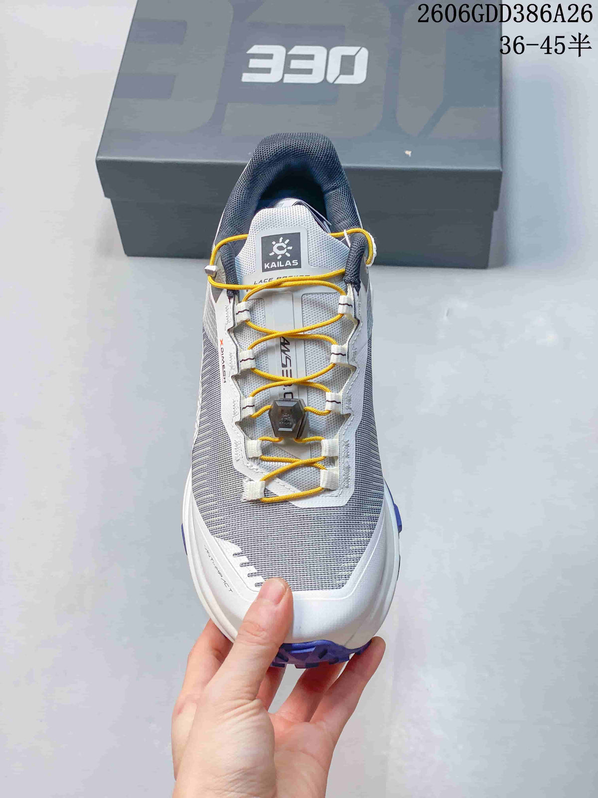 Top view of a Kailas FUGA EX330 shoe showing its yellow quick-lacing system