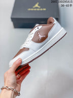 Side view showing the white-and-brown color blocking and embroidered Jordan logo.
