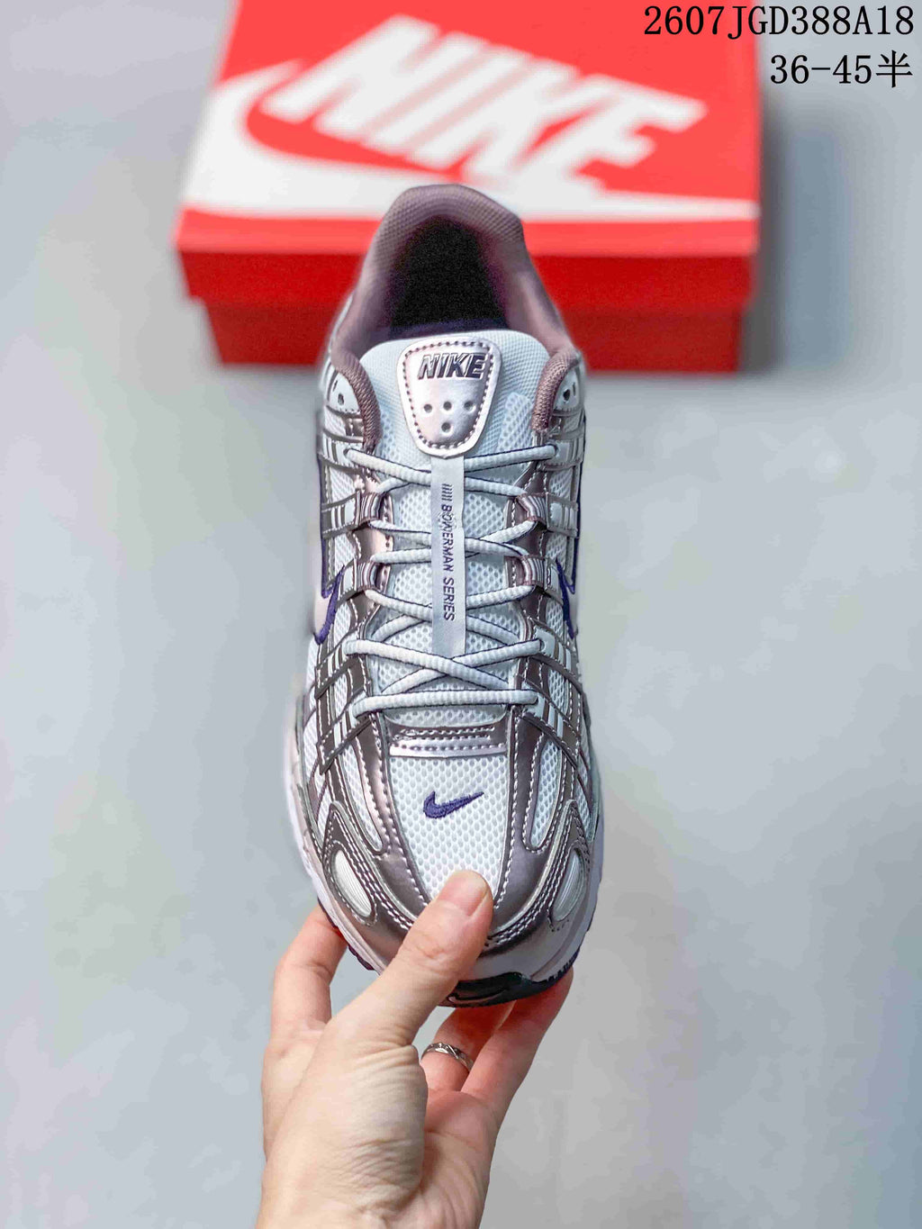 Top view of the Nike P-6000 sneaker showing the layered toe box, laces, tongue label and purple accents.