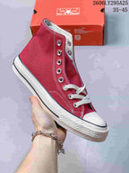 Burgundy high-top sneaker with white laces, metal eyelets, and a rubber toe cap; size range 35–45 is printed in the image.
