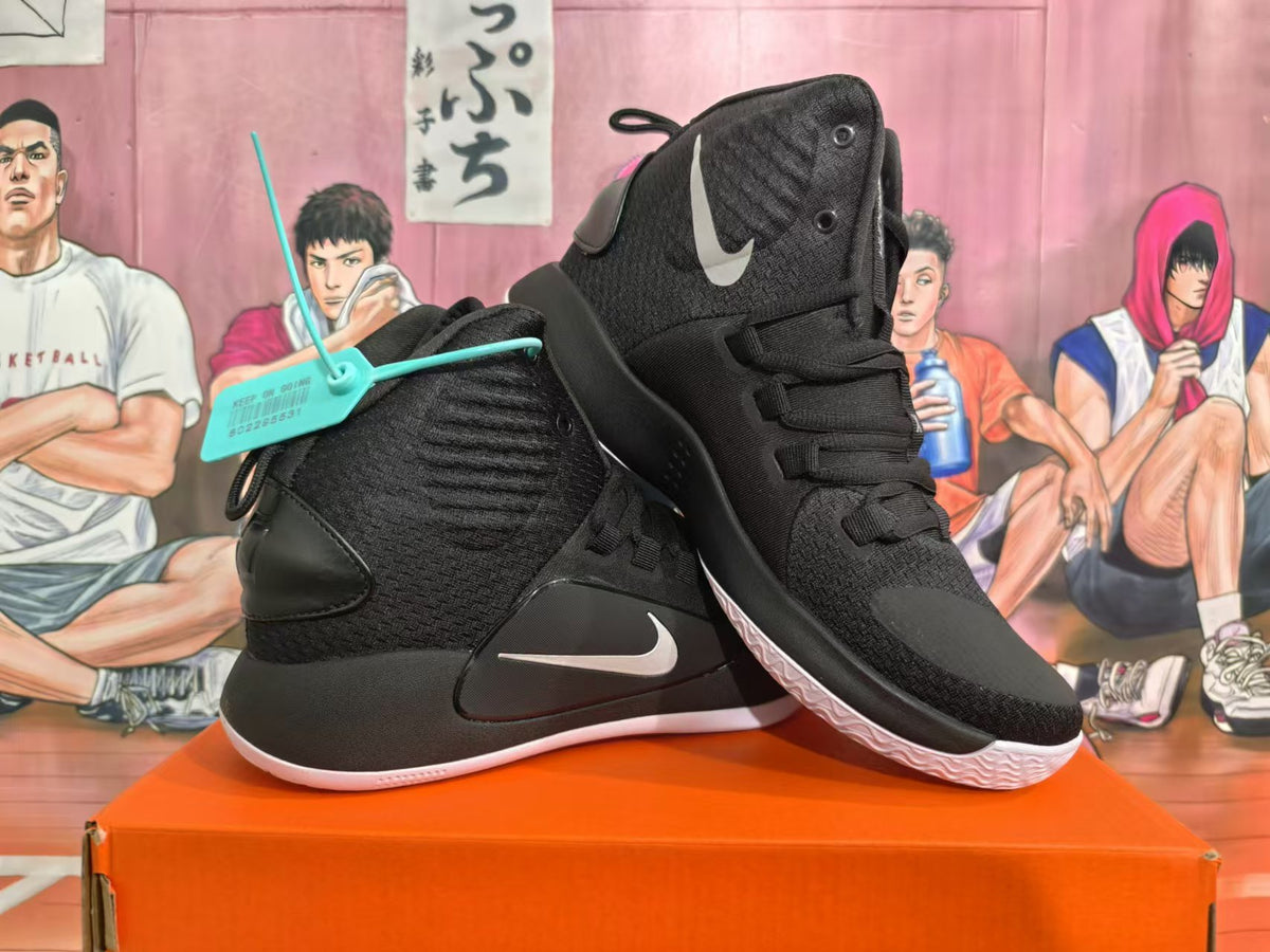 Pair of black Nike Hyperdunk high-top basketball shoes with silver Swoosh accents