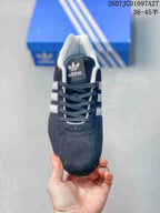 Top view showing the lace-up front, padded collar, and Adidas tongue branding.