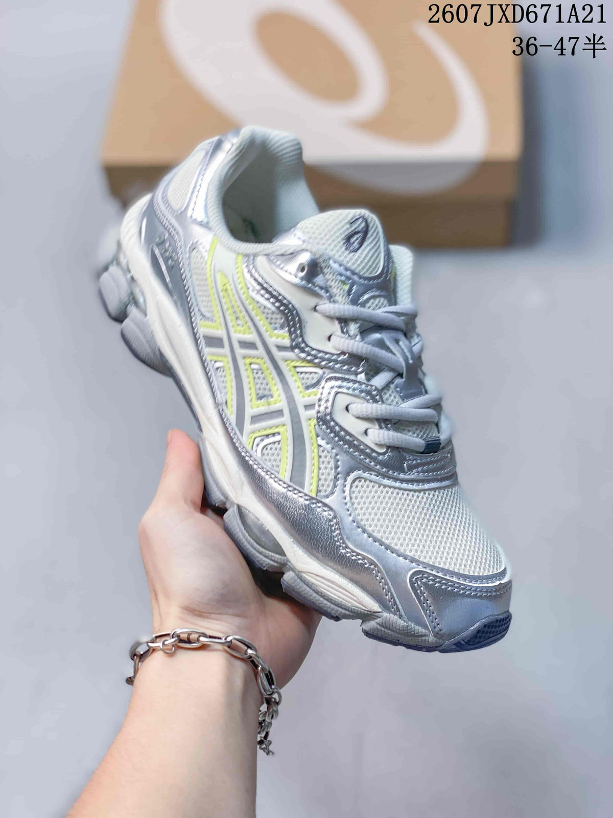 Angled side view highlighting the silver, white, and lime upper and textured outsole.