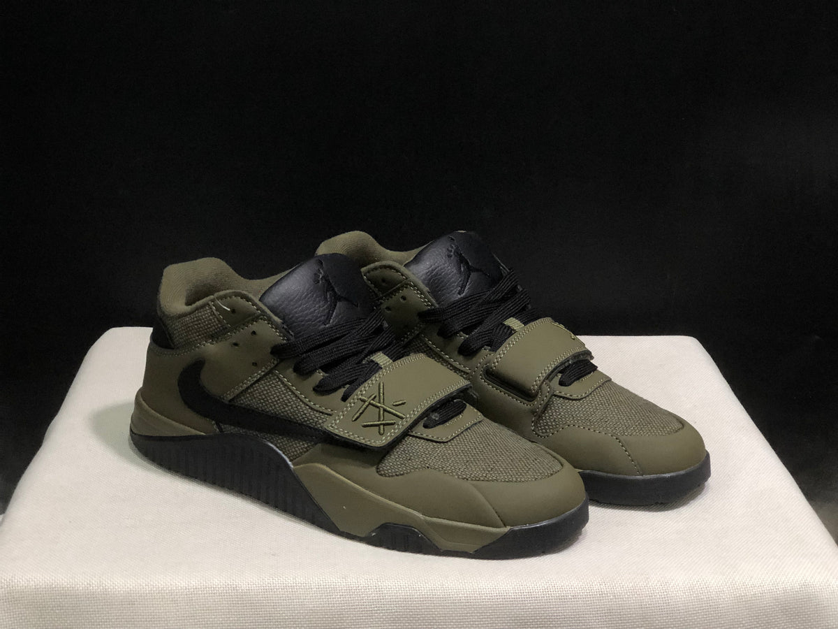Three-quarter front view of the olive and black sneaker pair with black laces and straps.