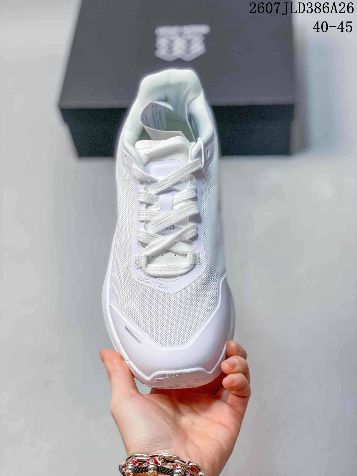 Top view of the white sneaker showing the lace arrangement, mesh-textured panels, and padded tongue.