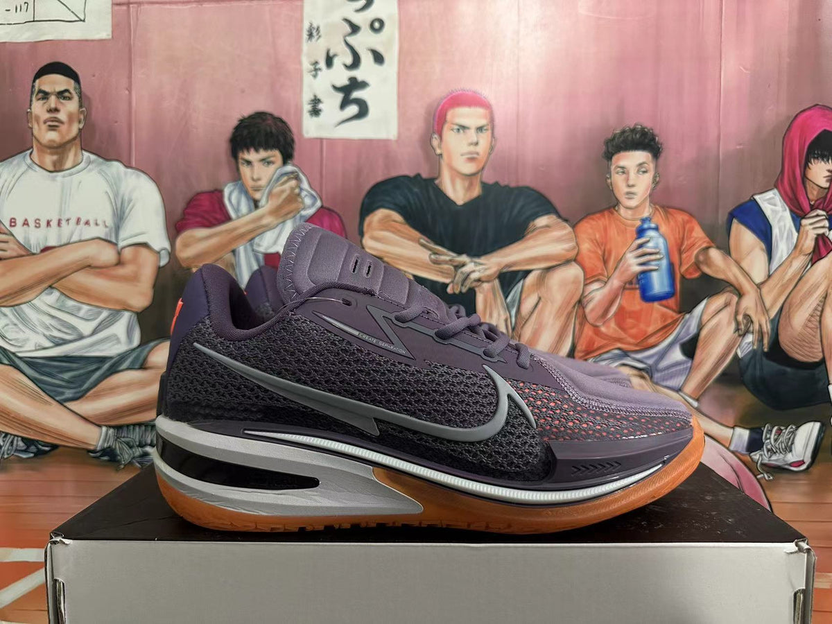 Side view of a purple Nike GT Cut 3 basketball shoe with gray Swoosh and gum-colored outsole.