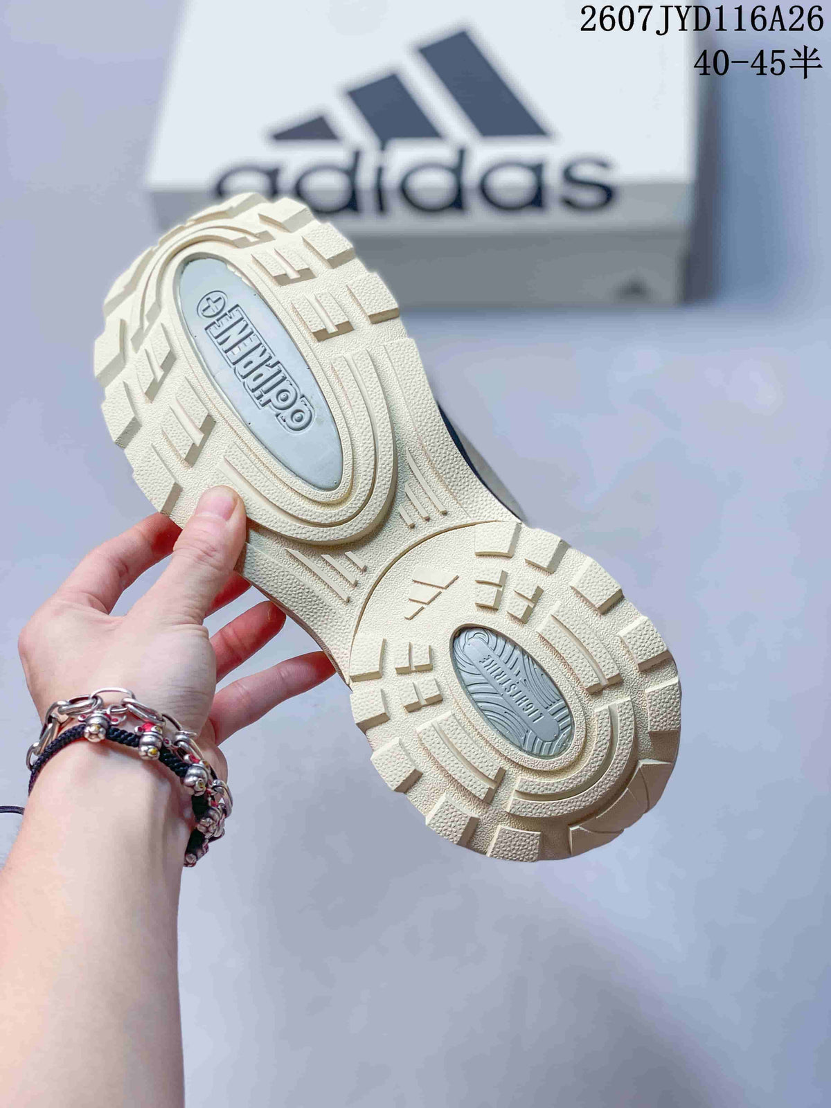 Close view of the textured outsole showing its layered circular and geometric tread pattern.