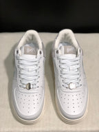Front view highlighting the perforated white toe boxes, lace closure, and metallic lace accessories.