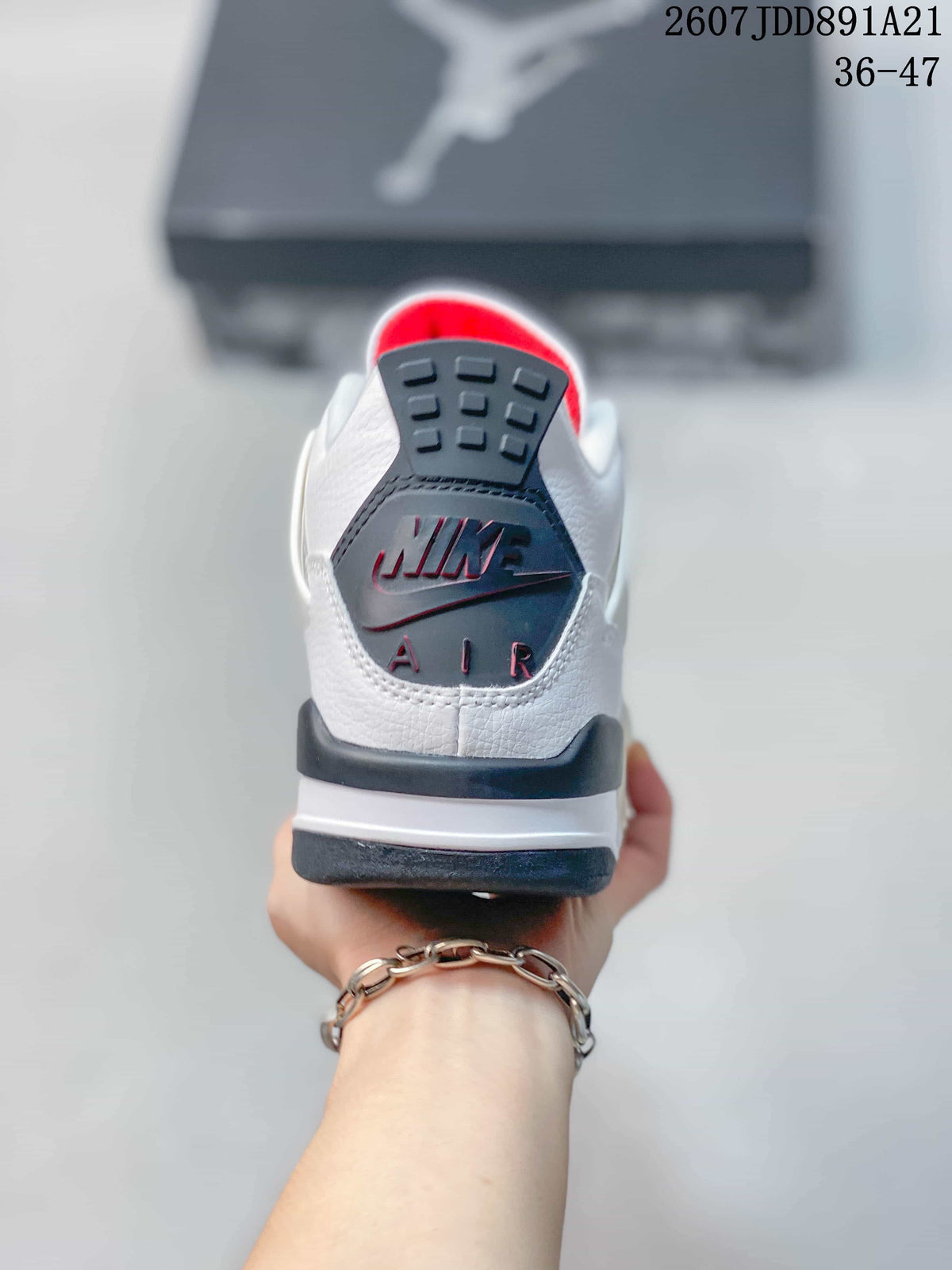 Rear view highlighting the black heel panel, Nike Air detail, and red accent.